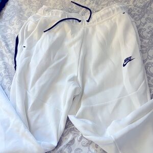 White Nike tech sweats